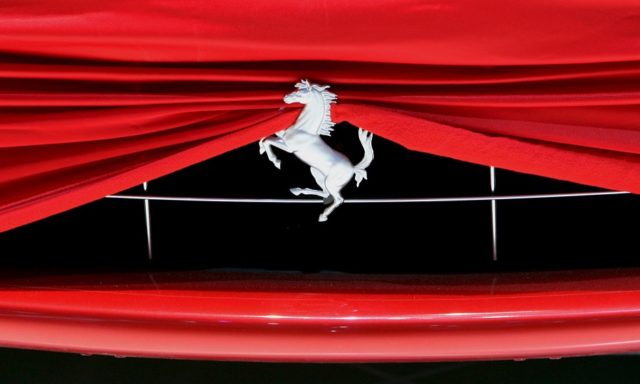 File photo of a cover on a Ferrari car at the Ferrari booth during a preview day of the 80th Geneva Car Show at the Palexpo in Geneva